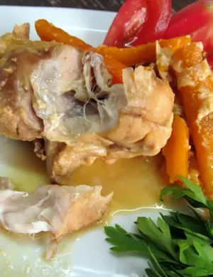 Кролик тушеный в молоке с морковью и луком