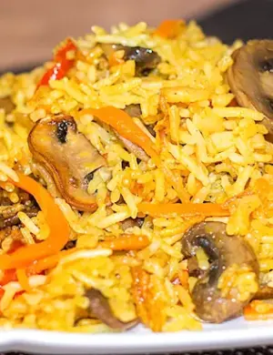 Плов с грибами шампиньонами