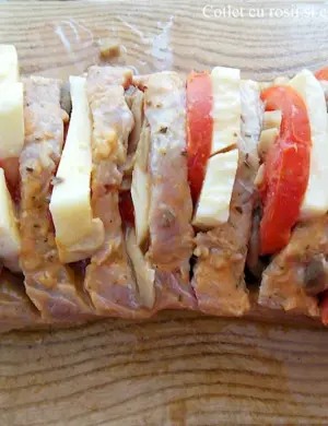 Свинина в духовке с помидорами и сыром