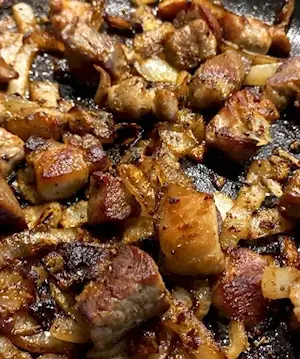 Свинина жареная с луком